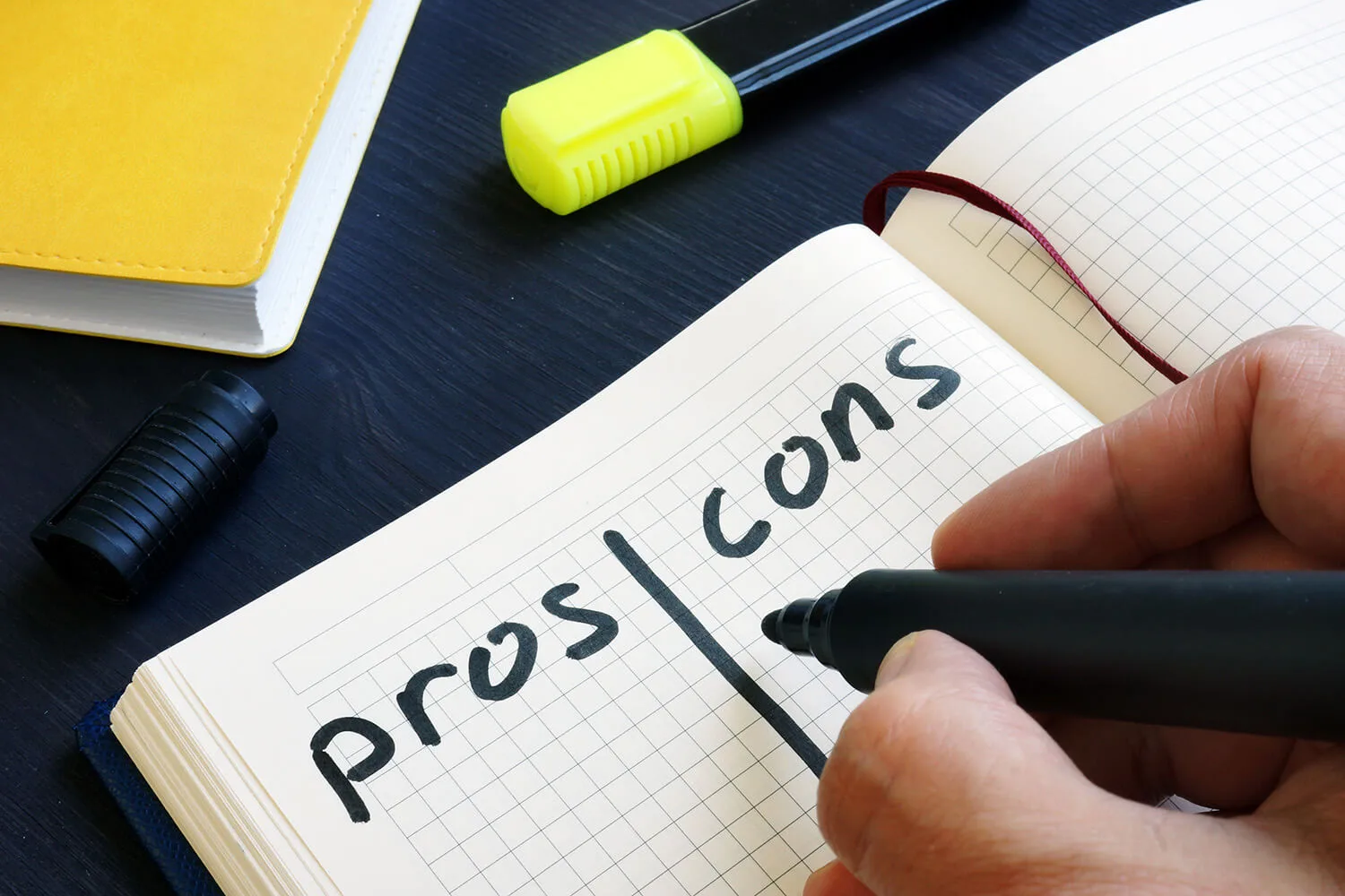 pros and cons written pros and cons written on paper